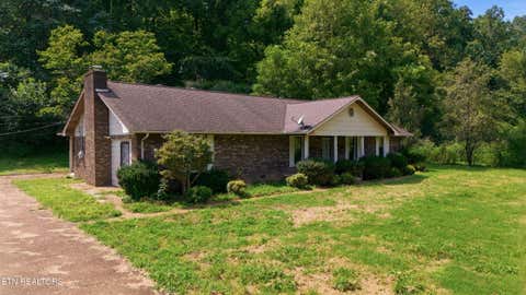 Photo of 1588 TN-116, Caryville, TN 37714 (MLS # 1353063)