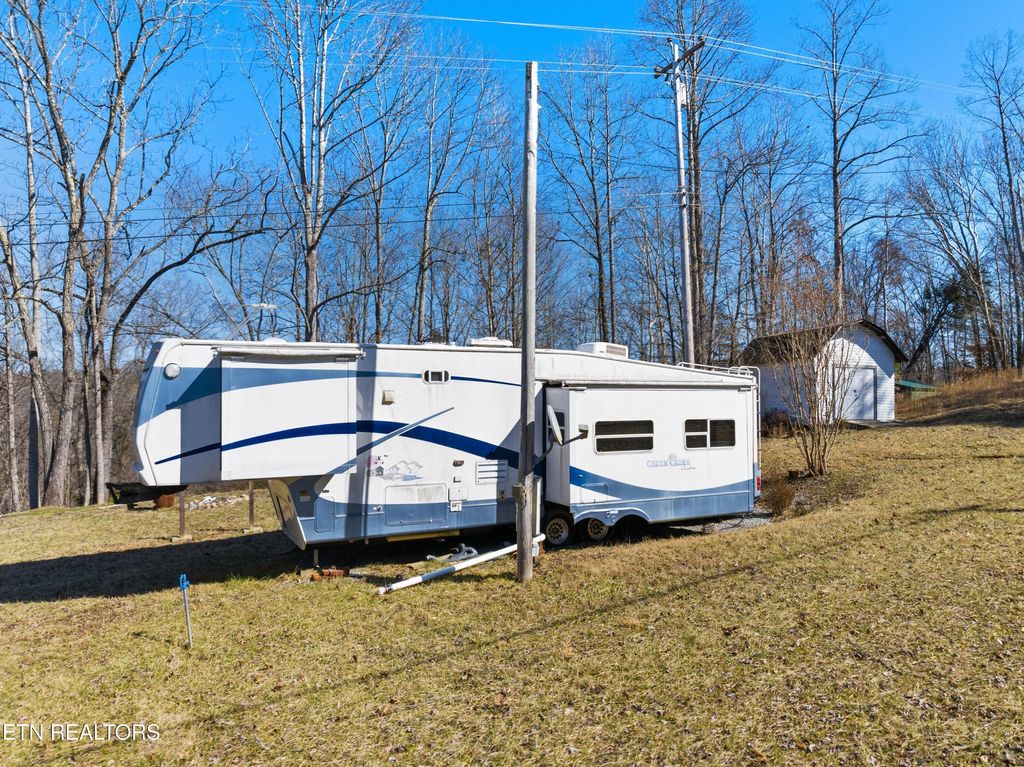 Photo of TBD Cave Springs Rd, Tazewell, TN 37879 (MLS # 1292579)