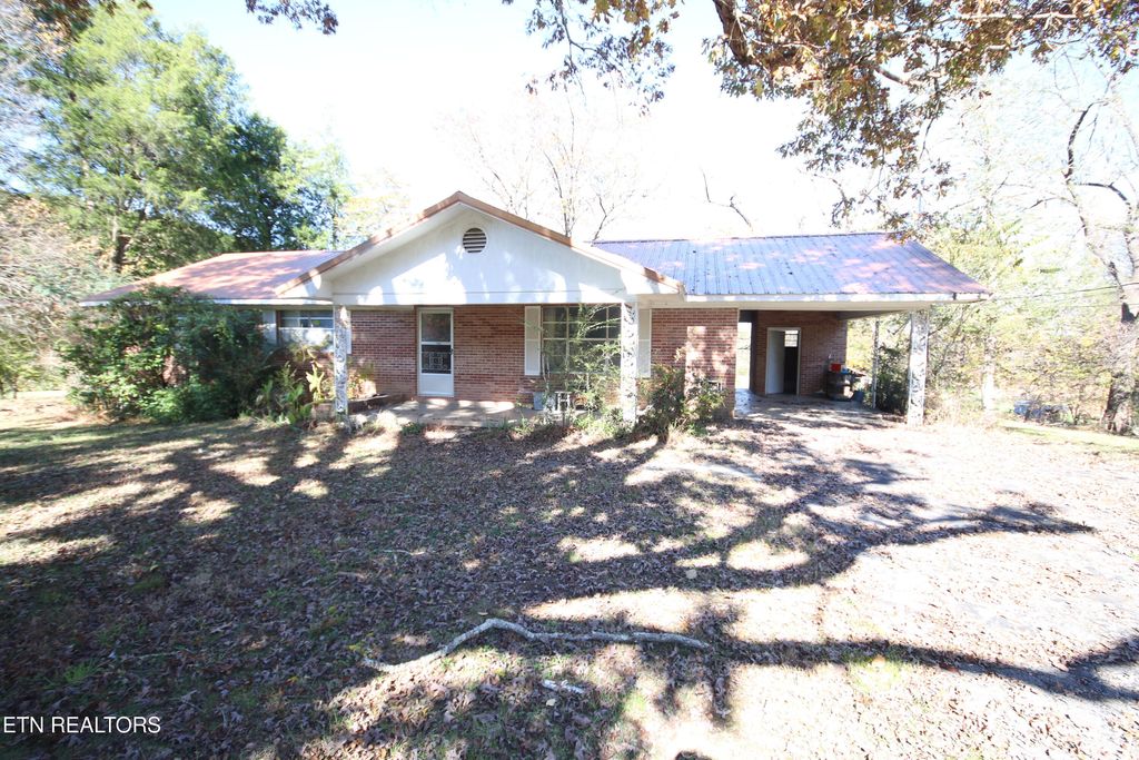 Photo of 111 Smokey Run Rd. Rd, Tellico Plains, TN 37385 (MLS # 1321059)