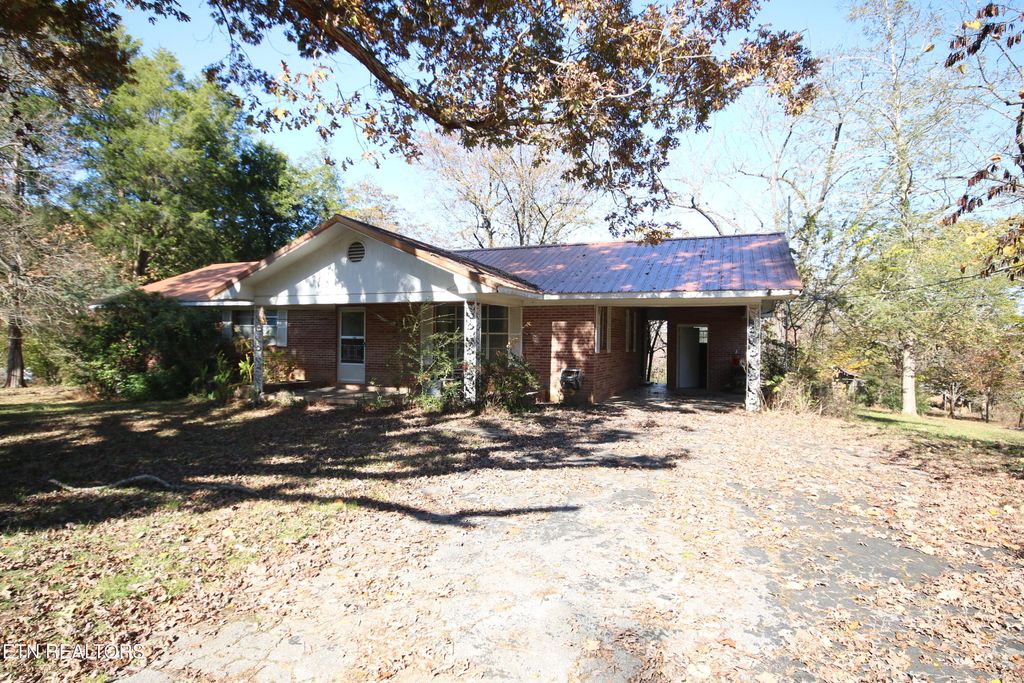 Photo of 111 Smokey Run Rd. Rd, Tellico Plains, TN 37385 (MLS # 1321059)