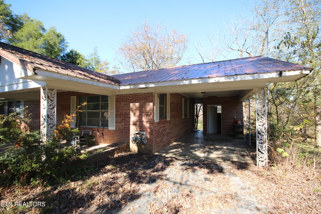 Photo of 111 Smokey Run Rd. Rd, Tellico Plains, TN 37385 (MLS # 1321059)