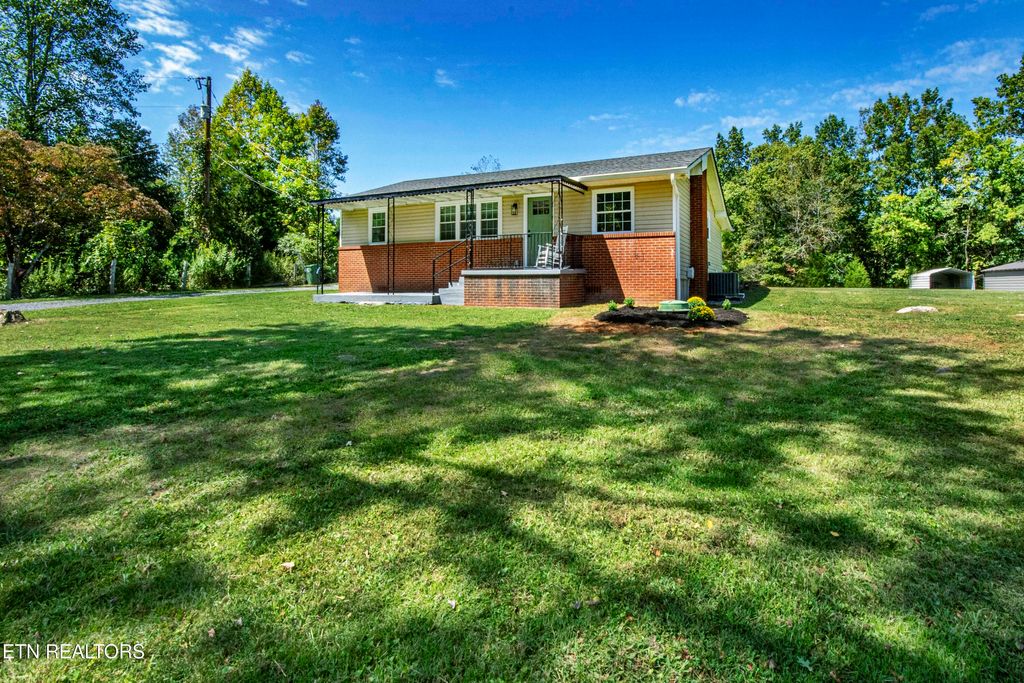 Photo of 8213 Tazewell Pike, Corryton, TN 37721 (MLS # 1312592)