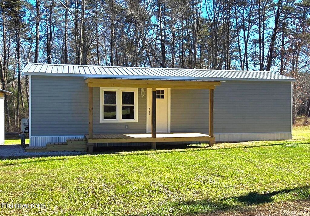 Photo of 910 Barnett Bridge Rd, Lancing, TN 37770 (MLS # 1322210)