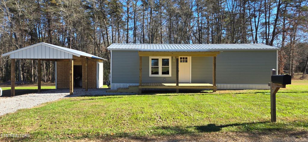 Photo of 910 Barnett Bridge Rd, Lancing, TN 37770 (MLS # 1322210)
