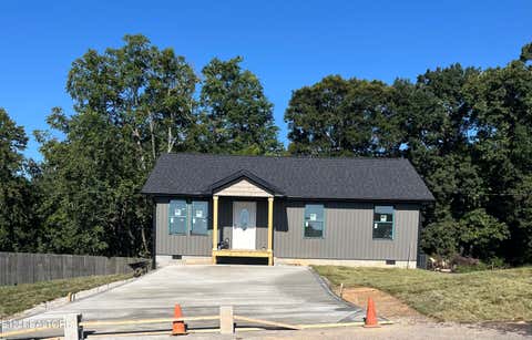 Photo of 207 Long Hollow Rd, Clinton, TN 37716 (MLS # 1353053)