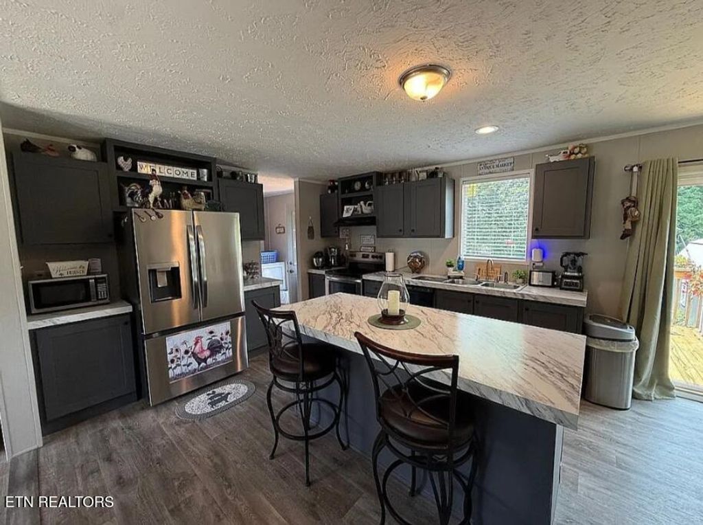 Photo of 114 Spain Circle Cir, Harriman, TN 37748 (MLS # 1312062)