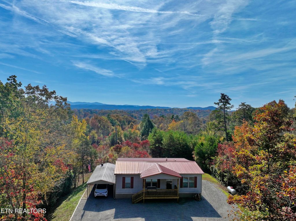 Photo of 519 Saw Mill Rd, Tellico Plains, TN 37385 (MLS # 1282598)