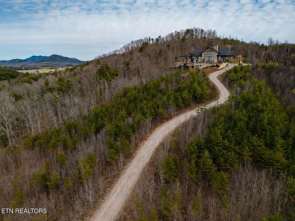 Photo of 6915 TN-360, Tellico Plains, TN 37385 (MLS # 1330242)