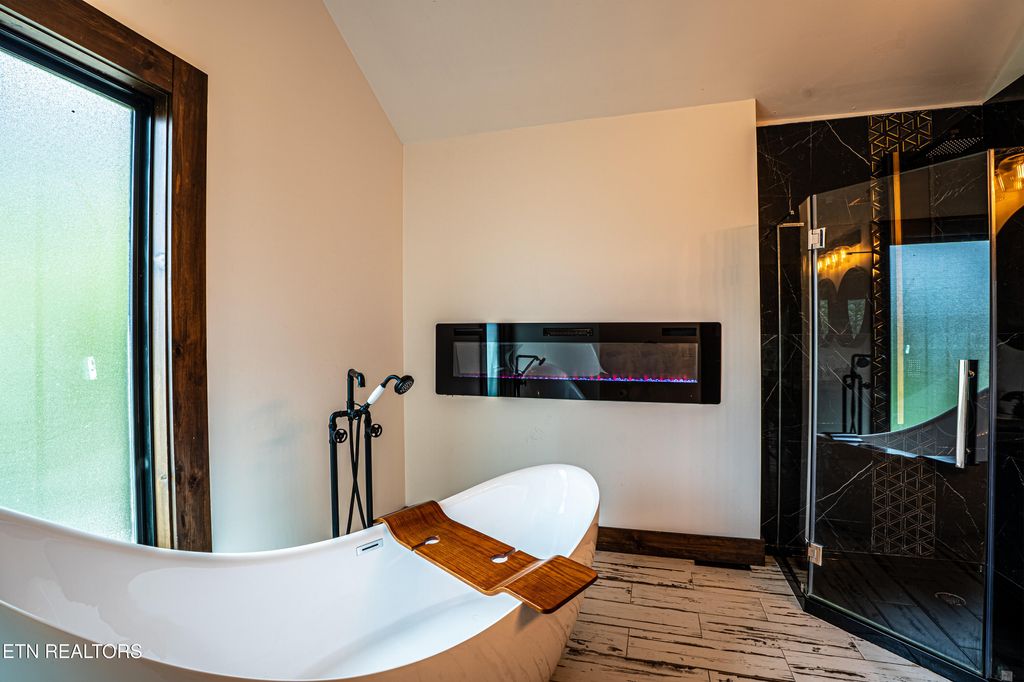 Photo of 887 Sourwood Drive, Gatlinburg, TN 37738 (MLS # 1313802)