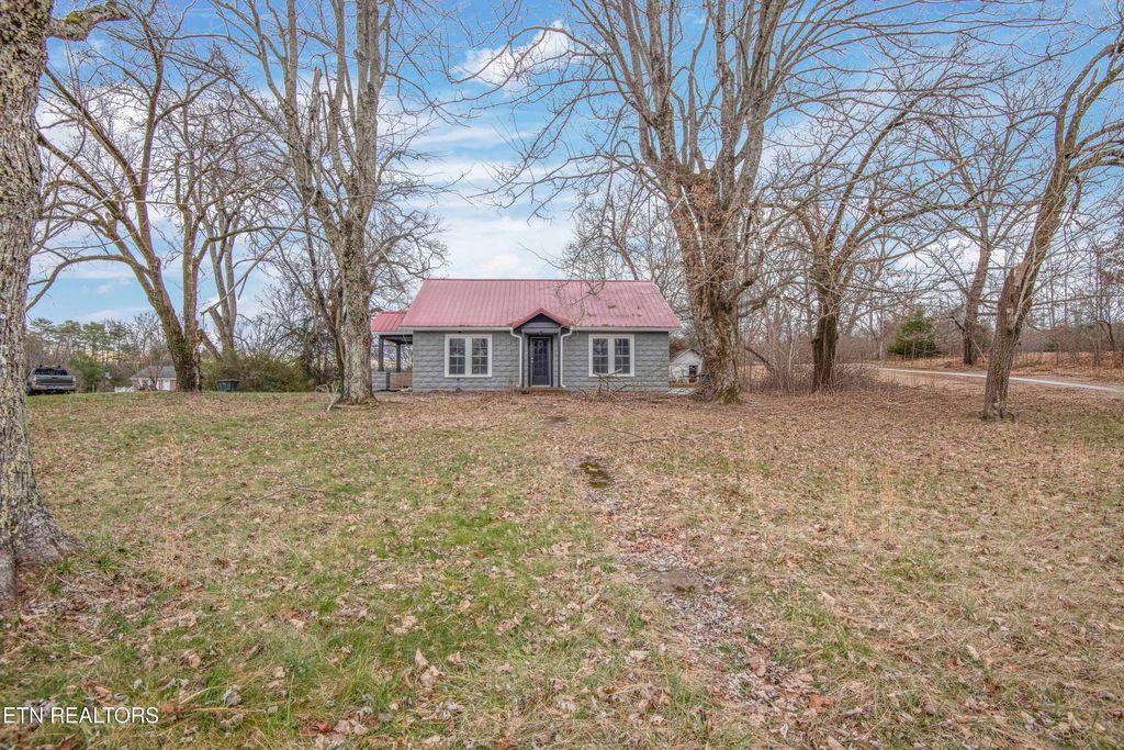 Photo of 843 Asheville Hwy, Strawberry Plains, TN 37871 (MLS # 1329853)