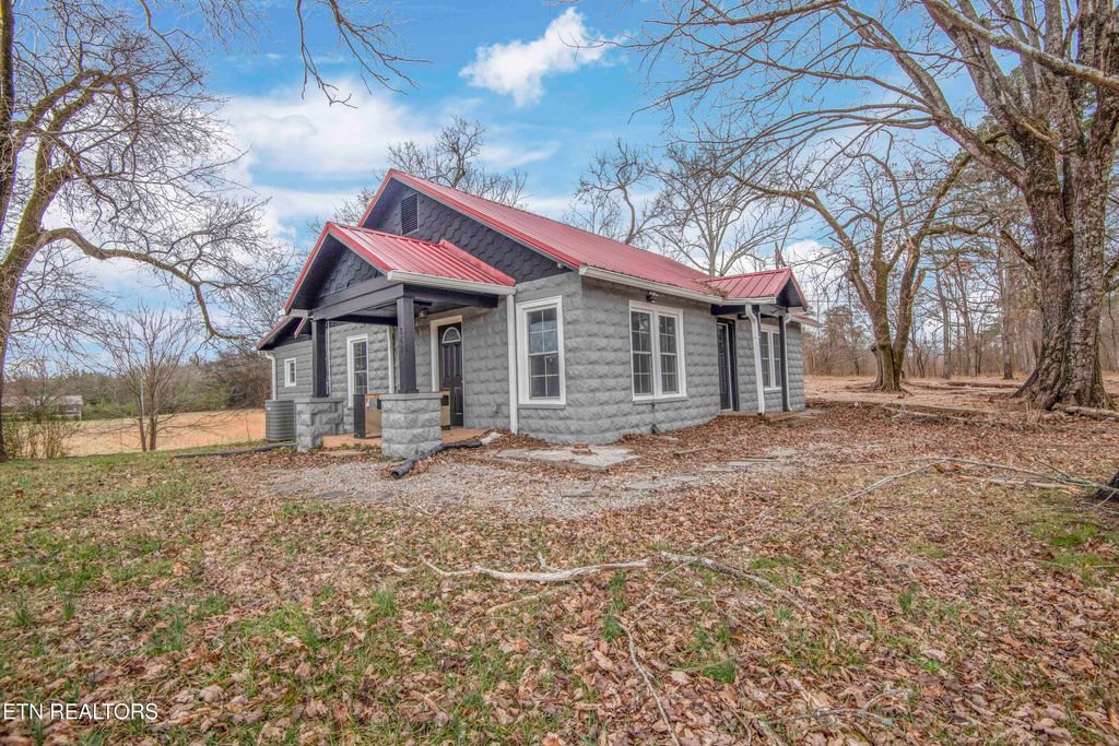 Photo of 843 Asheville Hwy, Strawberry Plains, TN 37871 (MLS # 1329853)