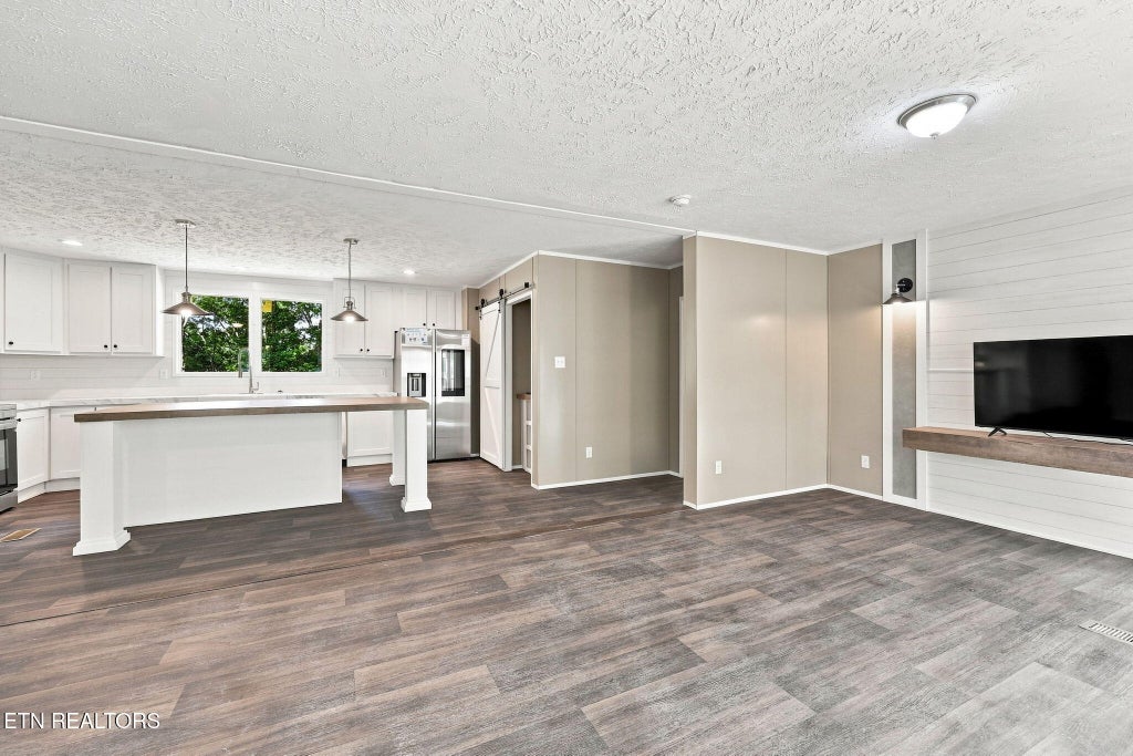 Photo of 260 Island Ford Rd, Rocky Top, TN 37769 (MLS # 1341519)