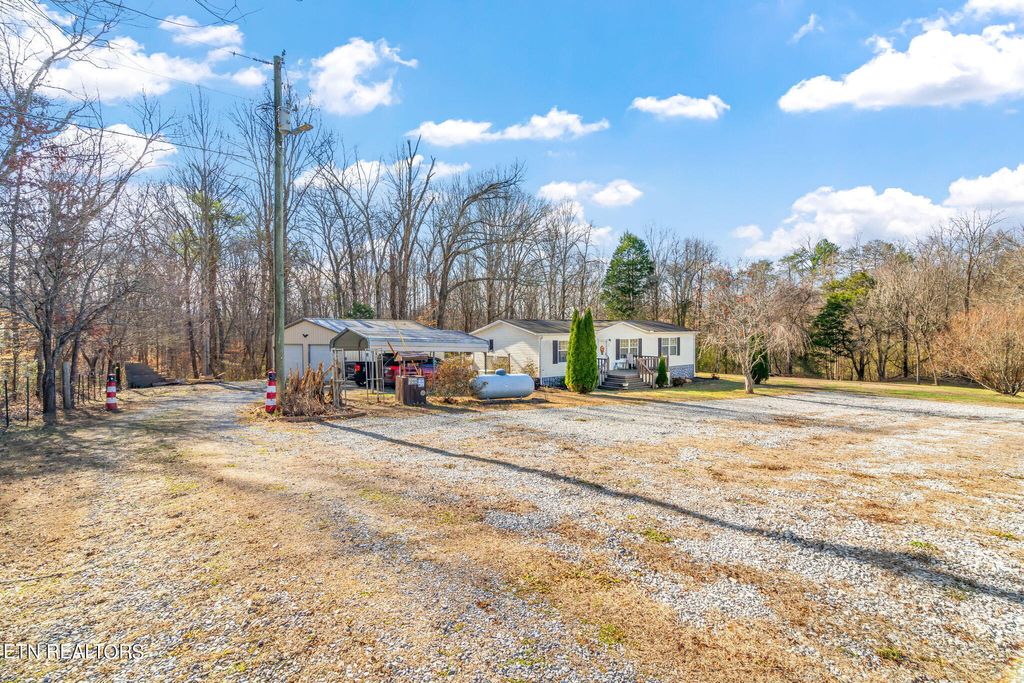 Photo of 156 Druid Hill Rd, Tellico Plains, TN 37385 (MLS # 1248695)