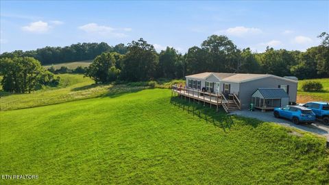 Photo of 215 Cain Rd, Sharps Chapel, TN 37866 (MLS # 1346007)