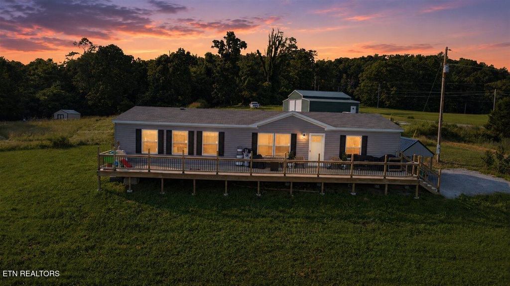 Photo of 215 Cain Rd, Sharps Chapel, TN 37866 (MLS # 1346007)