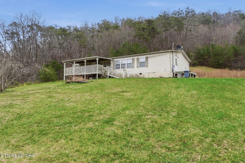 Photo of 357 Muncey Hollow Lane, Washburn, TN 37888 (MLS # 1323646)