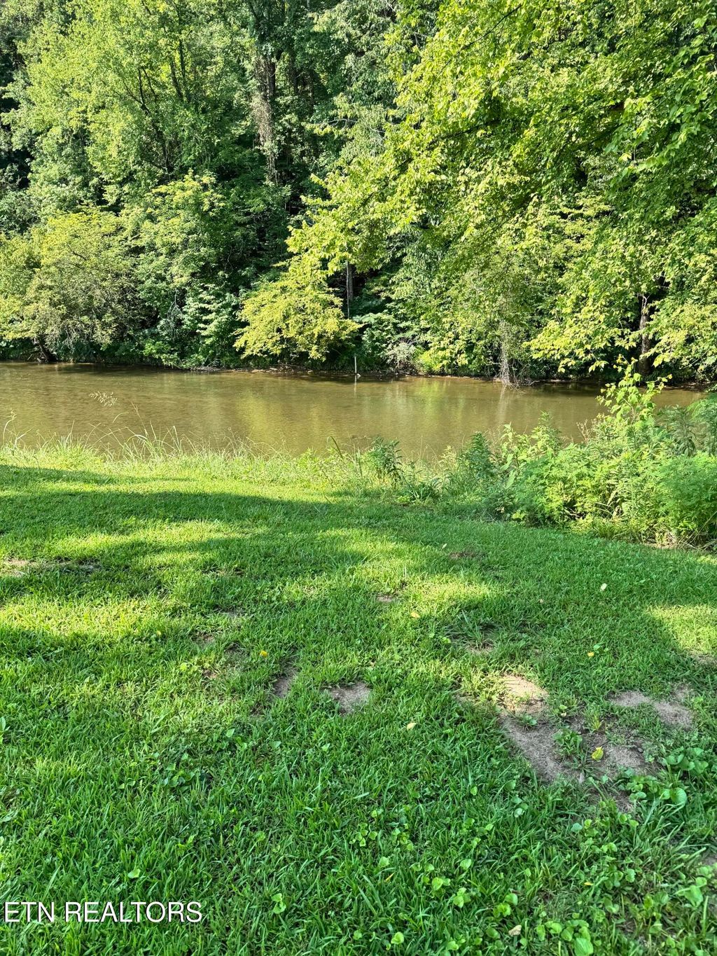 Photo of River Bank Rd, Pigeon Forge, TN 37863 (MLS # 1308284)