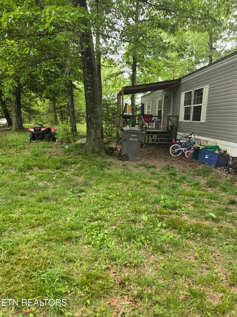 Photo of 182 Huse Potter Rd, Lancing, TN 37770 (MLS # 1319487) Photo of 182 Huse Potter Rd, Lancing, TN 37770 (MLS # 1319487)