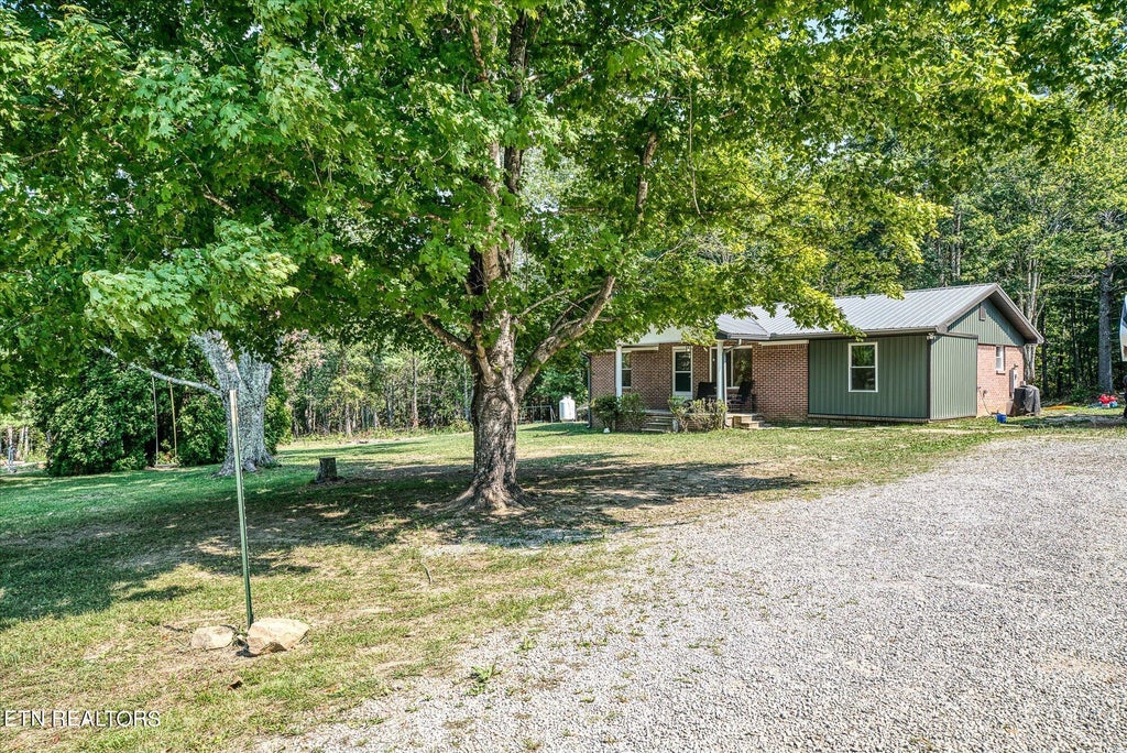 Photo of 7680 Wassom Memorial Hwy, Grandview, TN 37337 (MLS # 1273462)