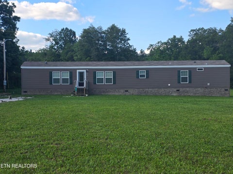 Photo of 812 W 3rd Ave, Oneida, TN 37841 (MLS # 1345809)
