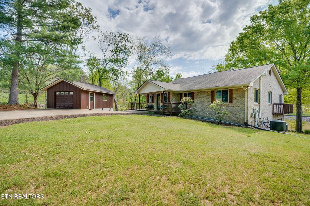 Photo of 408 Lake Hollow Rd, Piney Flats, TN 37686 (MLS # 1337642)