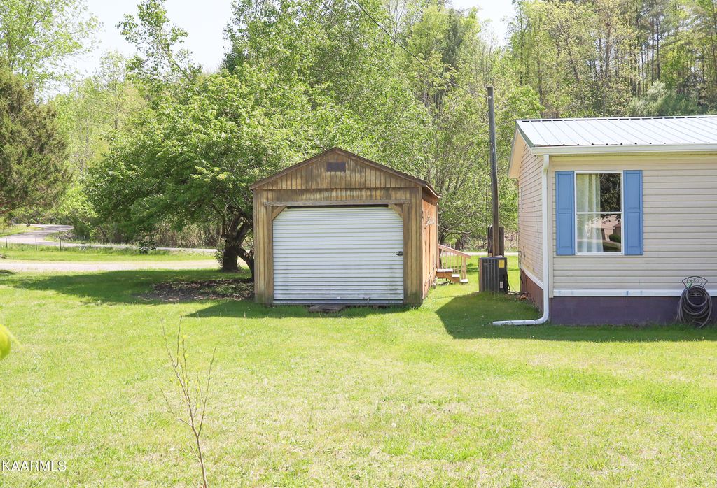 Photo of 147 Pond Rd, Oliver Springs, TN 37840 (MLS # 1224386)