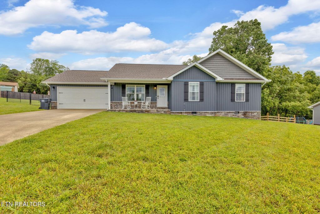 Photo of 142 Breezy Lane, New Tazewell, TN 37825 (MLS # 1303897)