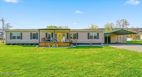 Photo of 112 E Dunn St, Rockwood, TN 37854 (MLS # 1335068)