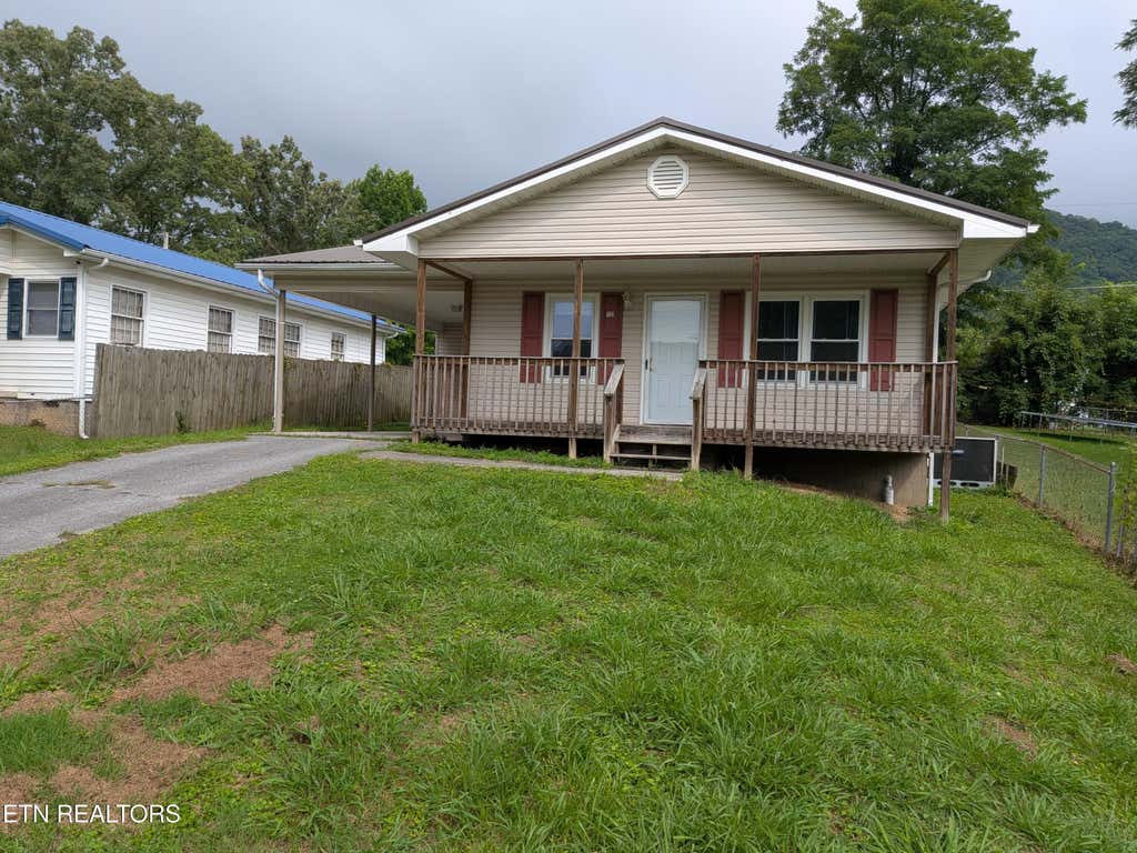 Photo of 712 W Walden St, LaFollette, TN 37766 (MLS # 1348718)