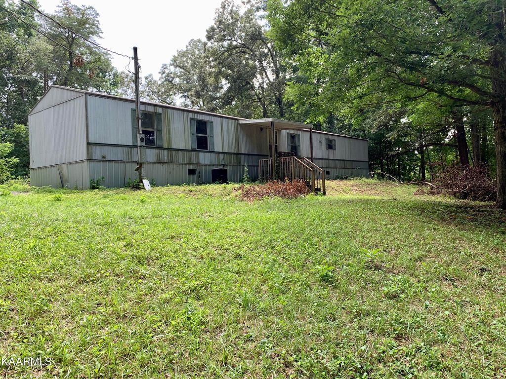 Photo of 1058 N Union Grove Rd, Friendsville, TN 37737 (MLS # 1235598)