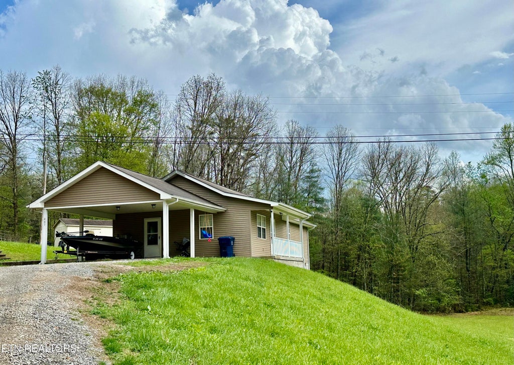 Photo of 467 Deer Lodge Hwy, Sunbright, TN 37872 (MLS # 1299134)