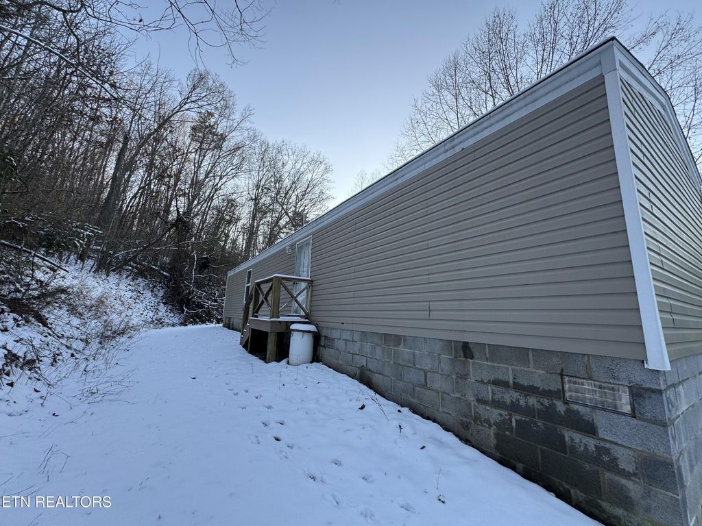 Photo of 320 Edwards Hollow Rd, New Tazewell, TN 37825 (MLS # 1287070)