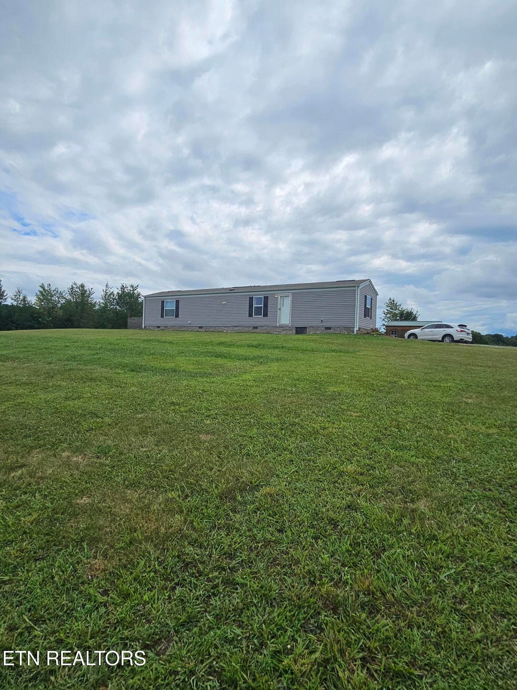 Photo of 1099 Lakeside Rd, Madisonville, TN 37354 (MLS # 1348212)