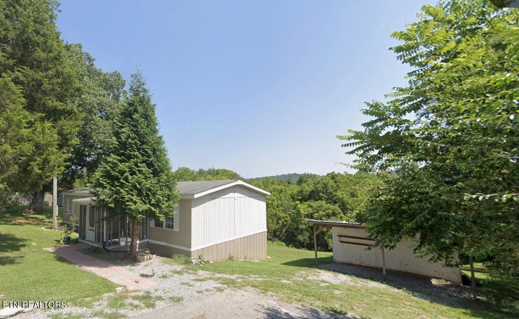 Photo of 121 Harness Rd, New Tazewell, TN 37825 (MLS # 1347720)
