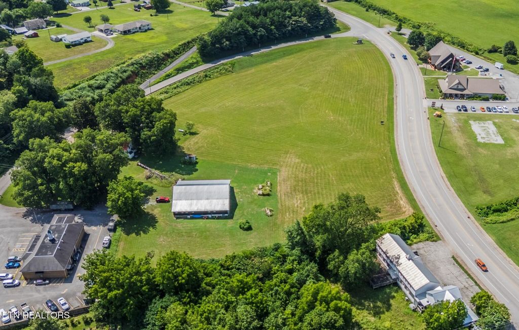 Photo of 1 Cherohala Skyway, Tellico Plains, TN 37385 (MLS # 1323018)