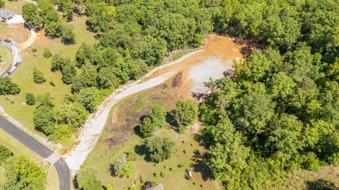 Photo of 0 RIVERBEND LN Lot 79 #Lot 79, Bath Springs, TN 38311 (MLS # 10221479)