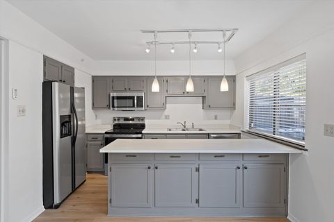 Photo of 1888 E POPLAR WOODS CIR 1888 #1888, Germantown, TN 38138 (MLS # 10209243)