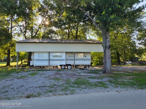 Photo of 431 PEVAHOUSE CAMP CIR, Decaturville, TN 38329 (MLS # 10224769)
