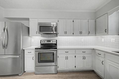 Photo of 1674 E RAVENHILL DR 49 #49, Germantown, TN 38138 (MLS # 10215643)