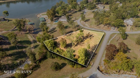 Photo of 0 RIVERS EDGE CIR Lot 12 #Lot 12, Bath Springs, TN 38311 (MLS # 10203353)