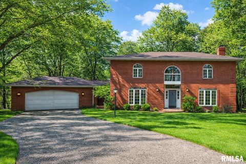 Photo of 319 W RAVINWOODS Road, Peoria, IL 61615 (MLS # PA1265721)
