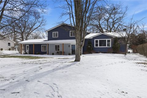 Photo of 93 Parkmeadow Drive, Henrietta, NY 14534 (MLS # R1667533)