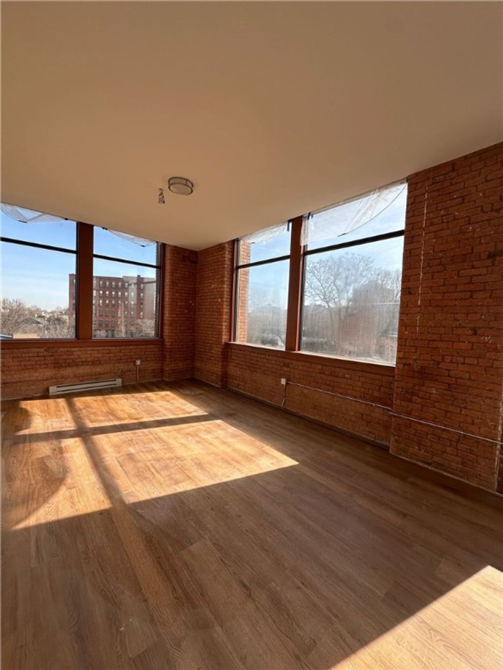 Photo of 64 Commercial Street #104, Rochester, NY 14614 (MLS # R1586408)