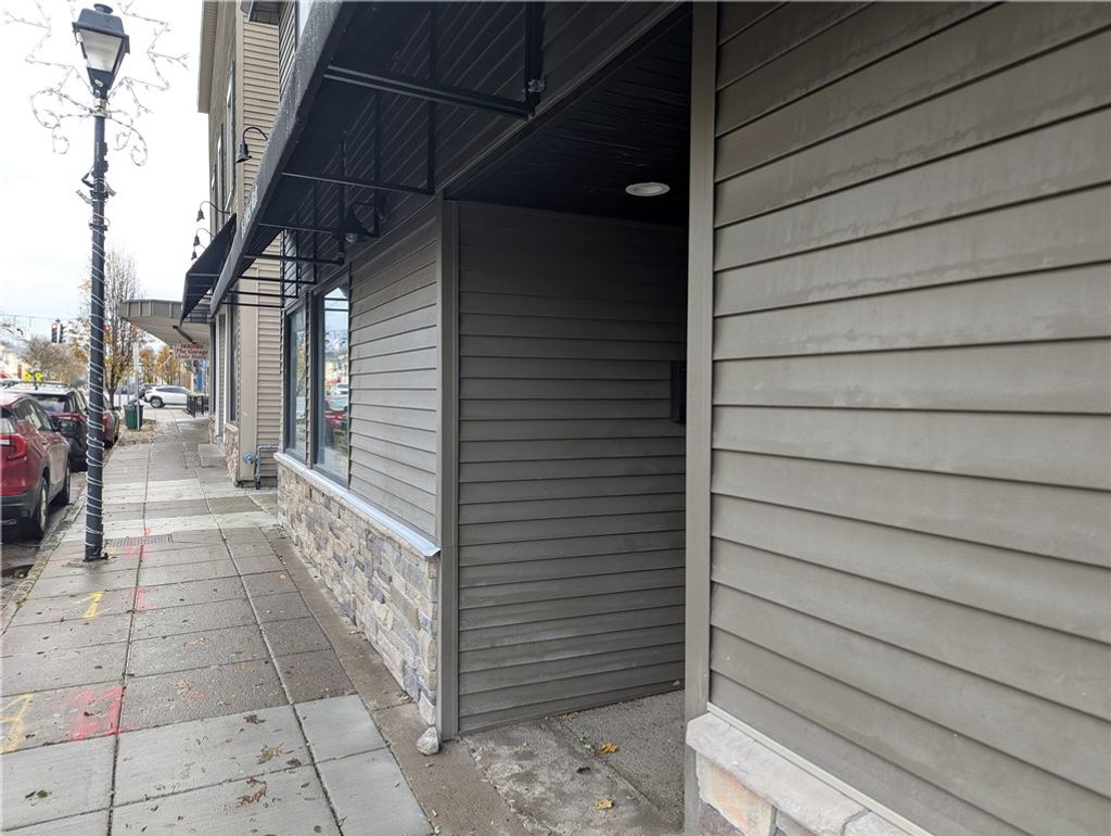 Photo of 20 W. Main St, Webster, NY 14580 (MLS # R1652352)