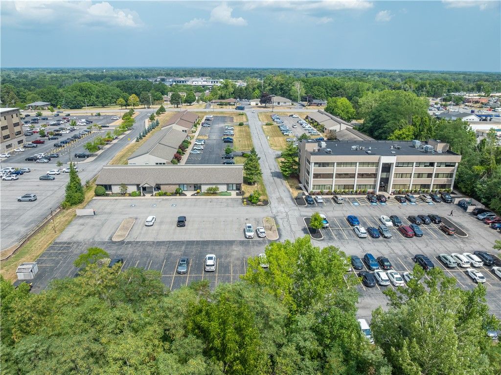 Photo of 121 Erie Canal Drive, Greece, NY 14626 (MLS # R1632184)