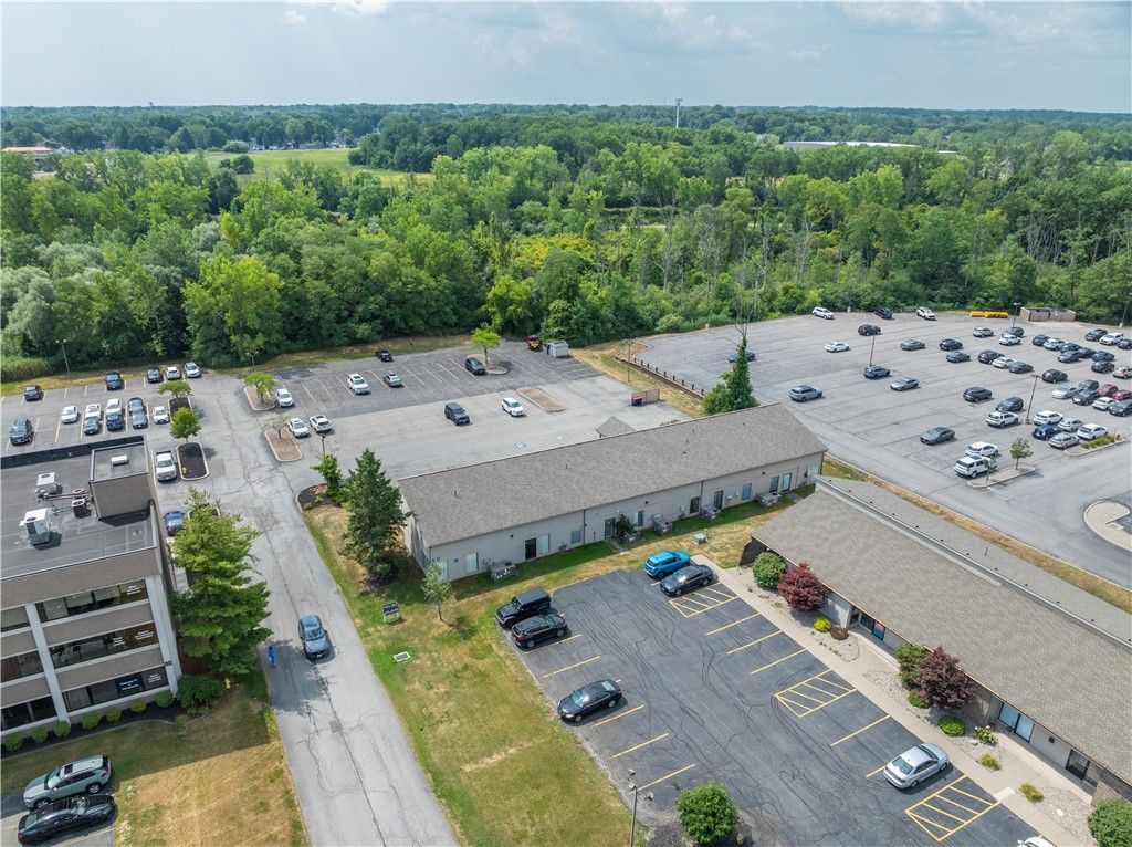 Photo of 121 Erie Canal Drive, Greece, NY 14626 (MLS # R1632184)