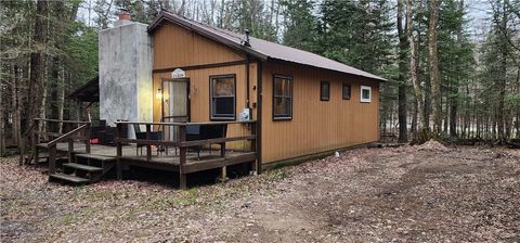 Photo of 121 Okara Road W, Webb, NY 13420 (MLS # R1678386)