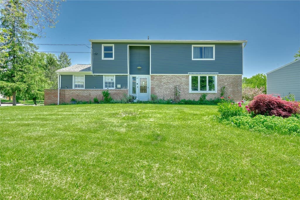 Photo of 68 Green Clover Drive, Henrietta, NY 14467 (MLS # R1709859)