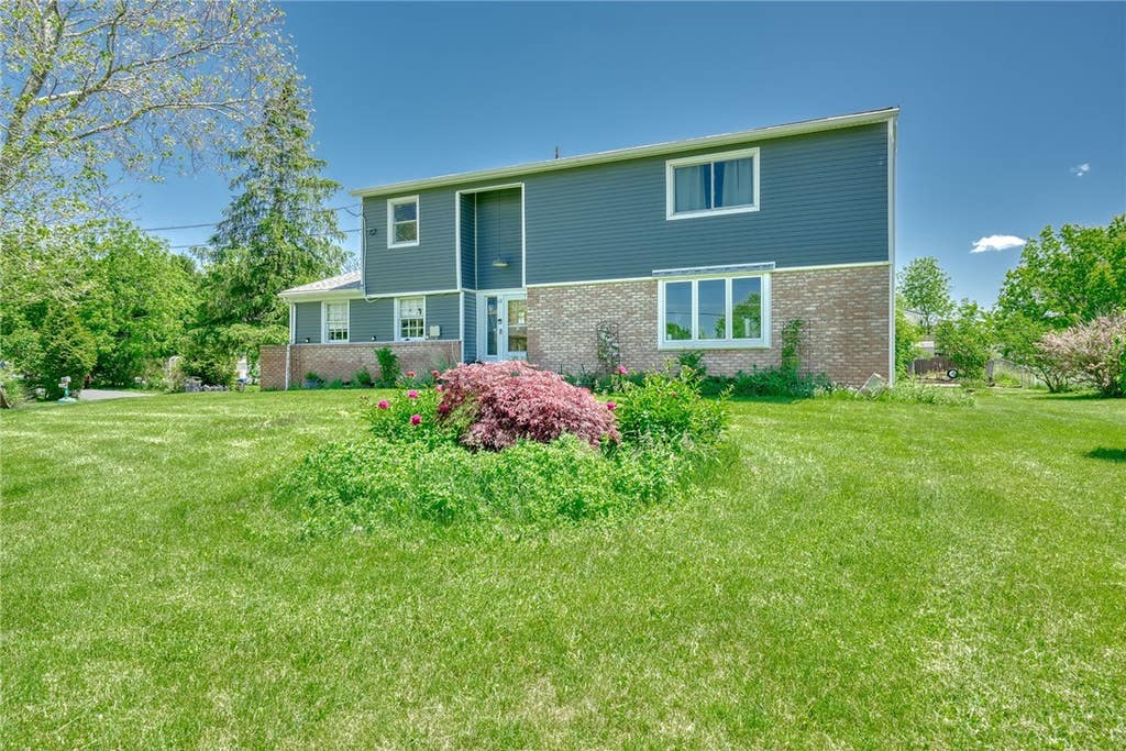 Photo of 68 Green Clover Drive, Henrietta, NY 14467 (MLS # R1709859)