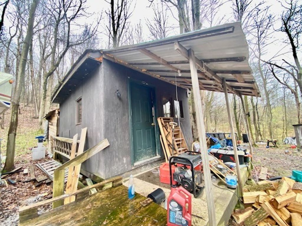 Photo of 6973 Echo Mountain Road, Canadice, NY 14560 (MLS # R1678110)
